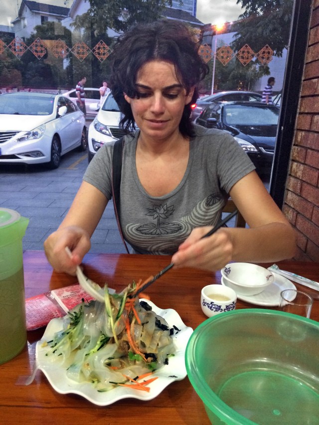 Nikki serves us dinner at the Quan Deli in Changsha.