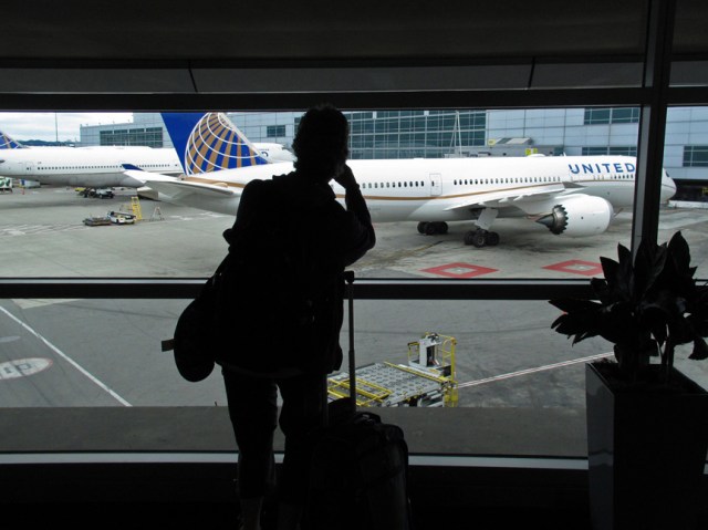 J taking plane photo